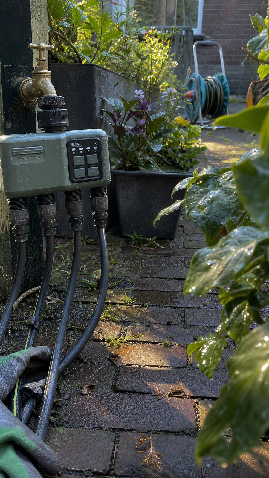 Johgee water timer in a wet courtyard install garden scene