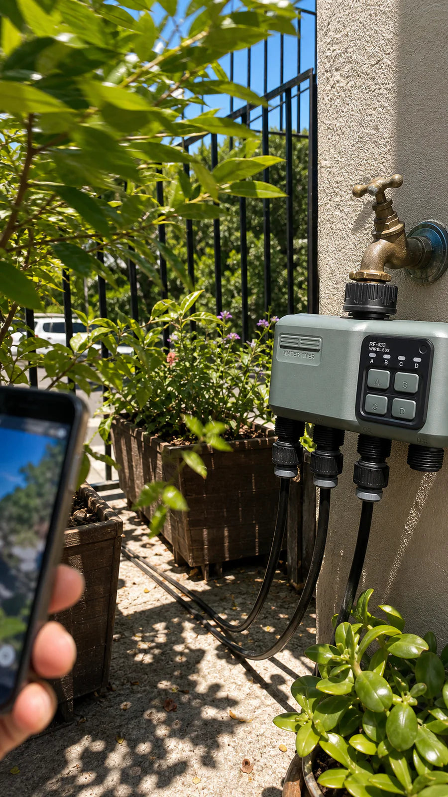 Johgee water timer in a balcony planters garden scene